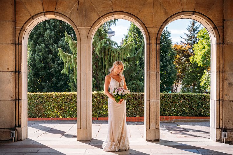 Arches at oakes garden theatre with bride